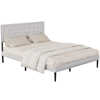 Grand lit moderne rembourré pour une chambre à coucher élégante et confortable avec une base en lattes de bois en tissu