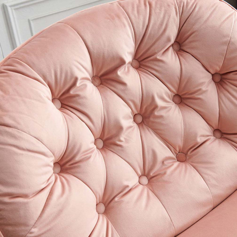 Chaise longue pivotante en velours de couleur rose avec tabouret