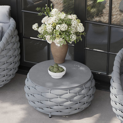 Table basse ronde d'extérieur avec plateau en marbre fritté à motif marbré