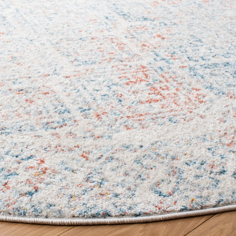 Tapis ivoire / terre cuite Dennison Southwestern, Rond 6 pi 7 po