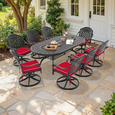 9-Piece Outdoor Dining Set, 81.89"L Oval Table with Umbrella Hole & 8 Swivel Chairs with Red Cushions