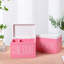 Boîte de rangement rose à compartiments pour soins personnels