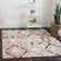 Tapis beige à motif géométrique Tucson