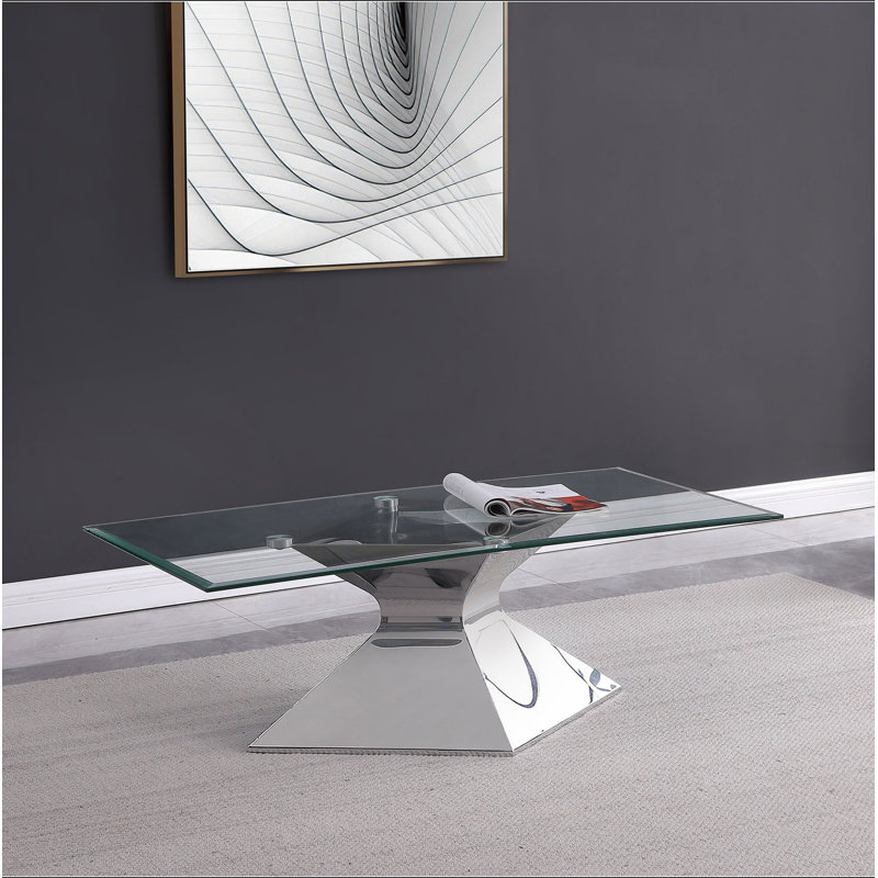 Table basse chromée avec plateau en verre