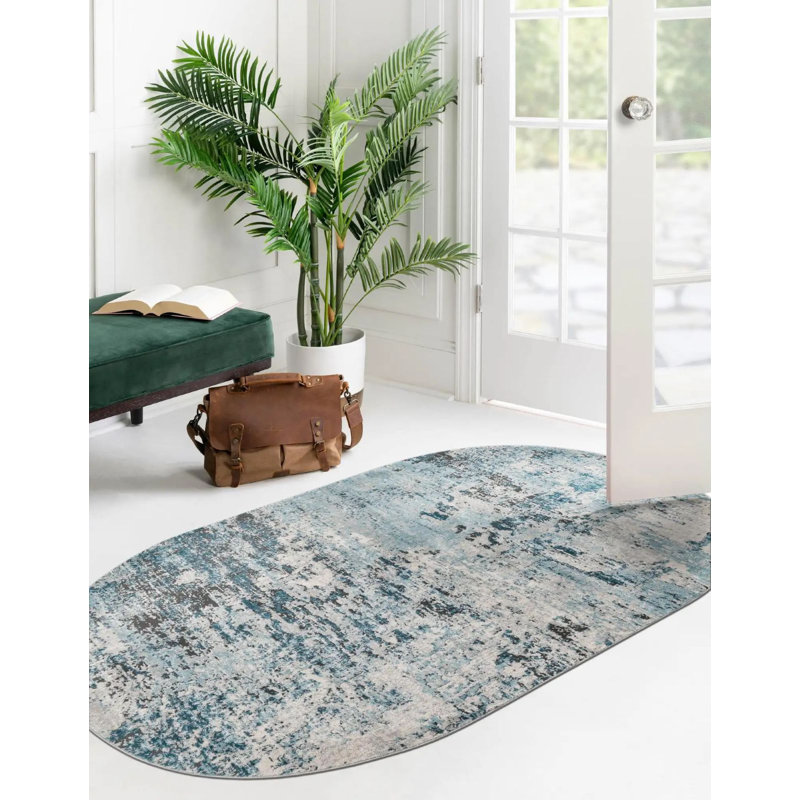 Tapis abstrait en polypropylène bleu / brun / gris tissé à la machine, Ovale 5 pi 3 po x 8 pi