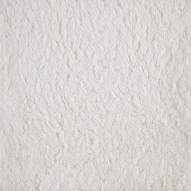 Repose-pieds rembourré en tissu de fausse fourrure blanc cassé Modern