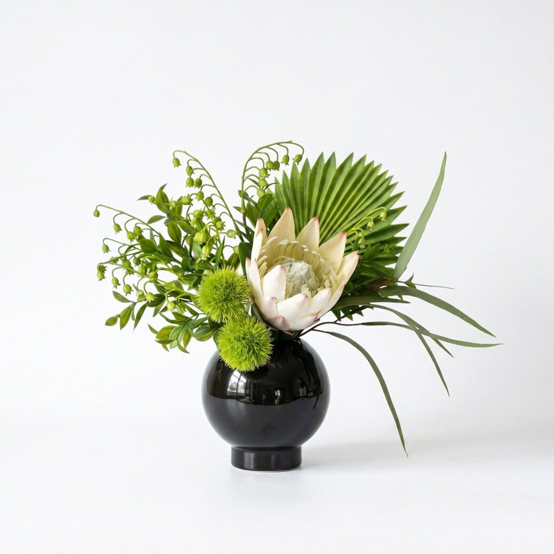 Fleurs artificielles avec vase