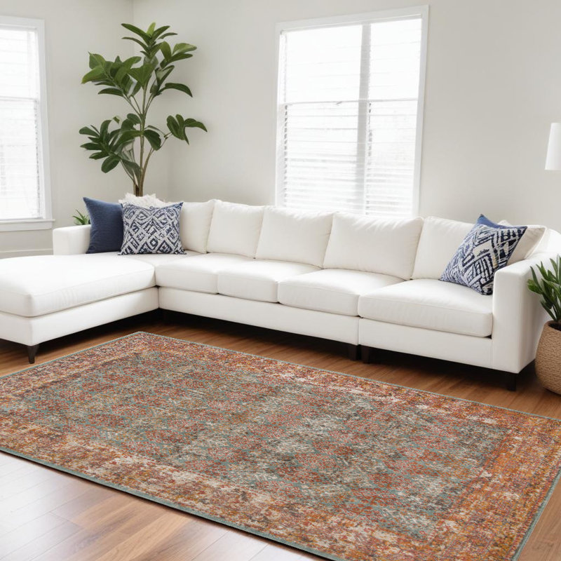 Tapis bleu sarcelle et orange usé / décoloré 10 pi x 14 pi