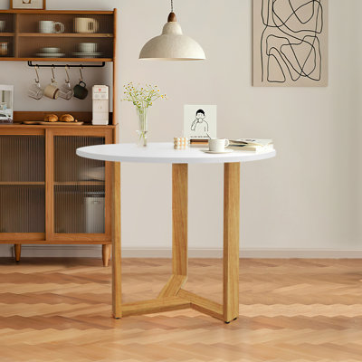 Jinay Round Solid Wood Base Dining Table