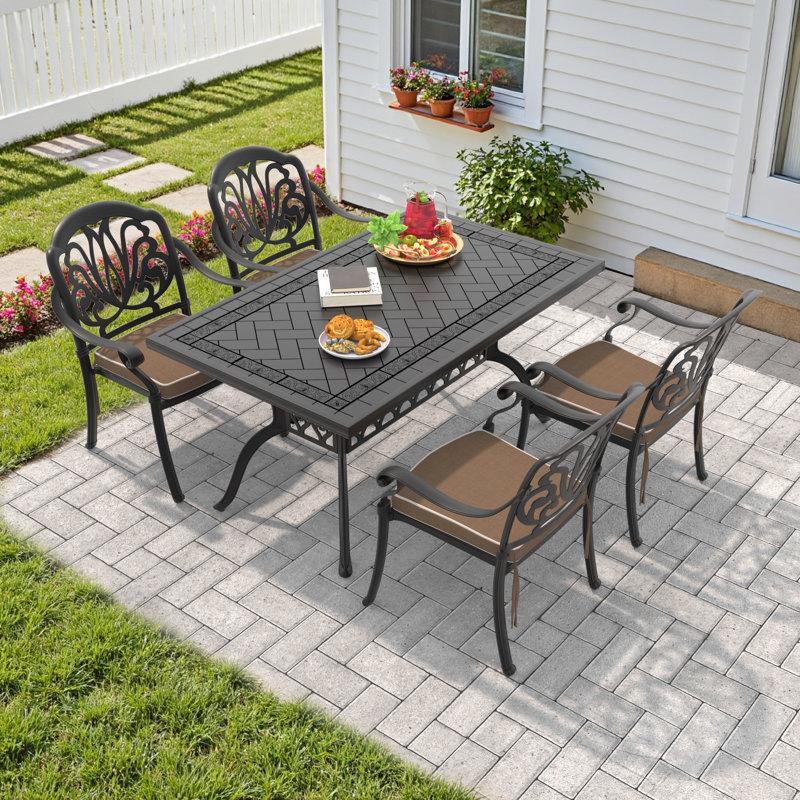  Ancle 4 - Person Patio Dining Set with Rectangular Table , Brown Cushions Included