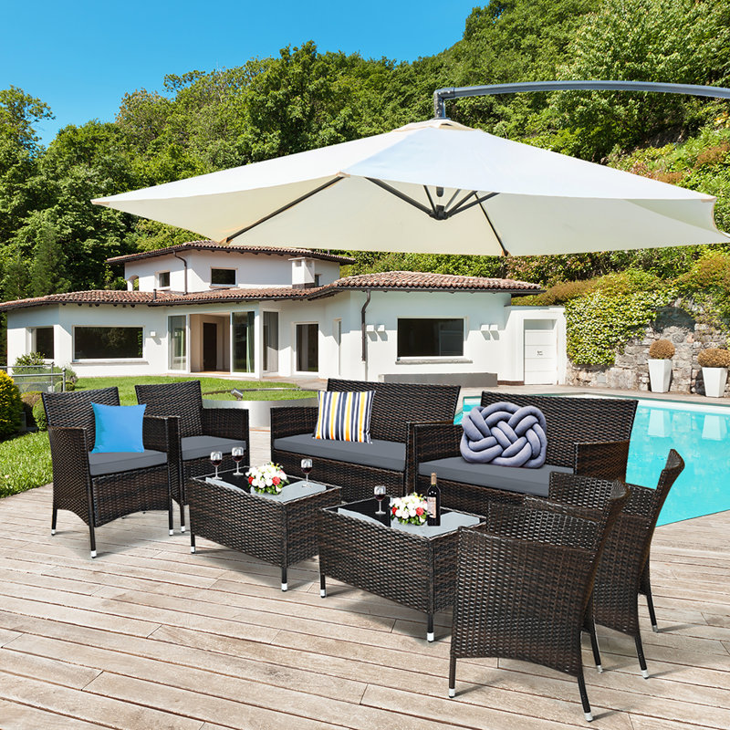 Rayna Wicker 8 - Person Patio Conversation Set with Cushions