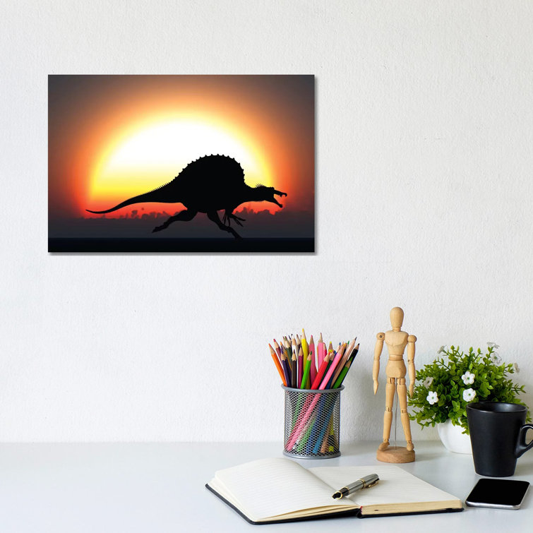 A Silhouetted Spinosaurus Sprinting Against a Setting Sun at the End of a Jurassic Day by Mark Stevenson - Wrapped Canvas Art Prints