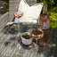 Dubose 4 - Person Wicker Patio Dining Set with Round Table , Cushions Included-128712913-37961051