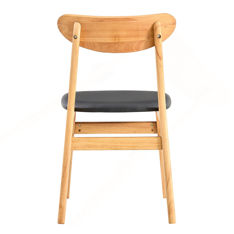 La chaise de salle à manger élégante et durable en bois massif, le petit dossier incurvé, le coussin en polyuréthane et la belle forme s'agencent parfaitement à n'importe quelle pièce et à un usage quotidien