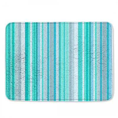 Tapis de bain bleu à rayures