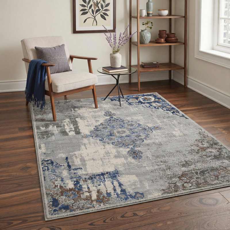 Tapis d'intérieur bleu / gris délavé à la machine à motif abstrait à motif médaillon abstrait Combs Vesper