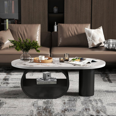 Winchester 47.24'' W Oval Stone and Faux Marble Coffee Table with Iron Base