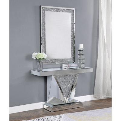 Console, miroir et faux diamants