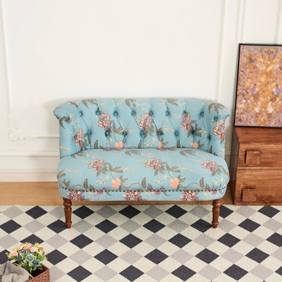 Chaise de style européen ornée d'un imprimé floral, avec pieds en pin massif teinté foncé, convenant à de multiples espaces de la maison comme une chambre, un dressing ou encore un salon.