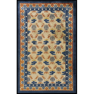 Tapis ivoire antique en laine Kansu