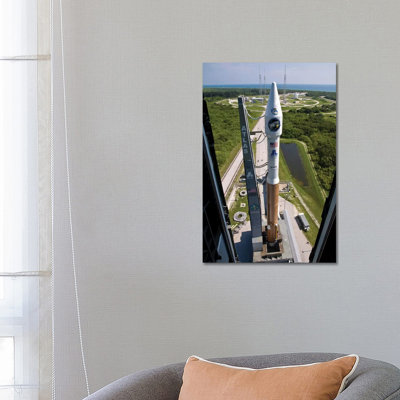 An Atlas V Rocket On The Launch Pad At Cape Canaveral Air Force Station, Florida by Stocktrek Images - Wrapped Canvas Print