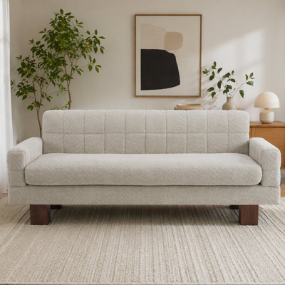 Causeuse moderne avec tissu capitonné et dossier capitonné