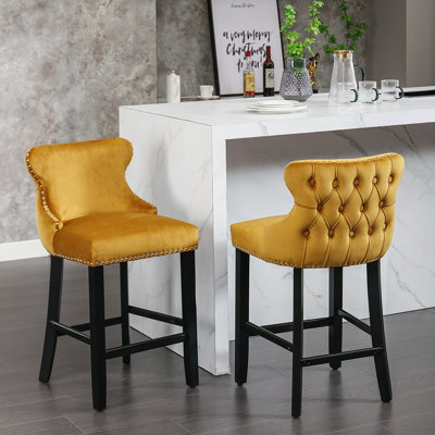 Tabourets de bar rembourrés en velours avec boutons capitonnés