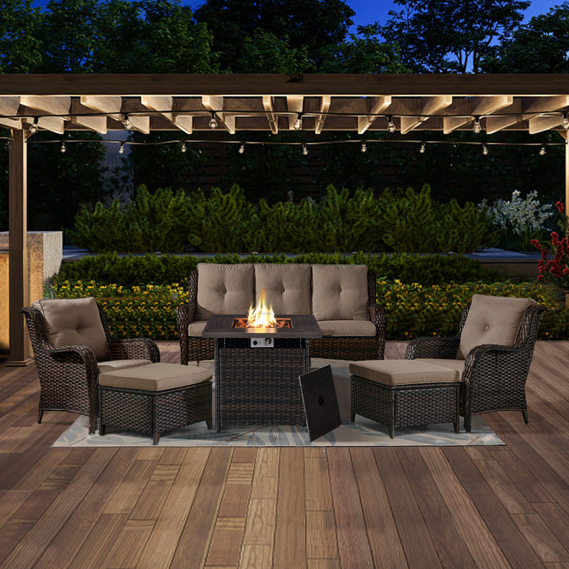 Schutt 5 - Person Wicker Outdoor Seating Group with Fire pit, Sofa, Chairs, Ottomans and Cushions, Brown, Beige