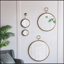 Élégant miroir mural circulaire avec cadre en métal durable, idéal pour rehausser la décoration intérieure et créer une ambiance spacieuse.-1818395635