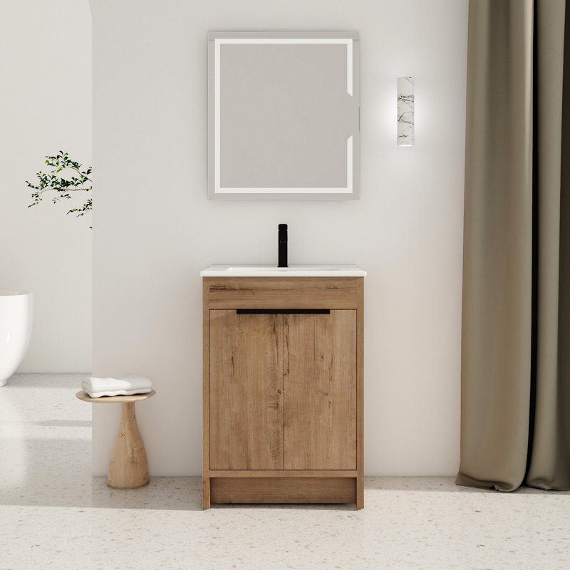Meuble-lavabo de salle de bain avec lavabo en céramique. 24 po autoportante. 2 portes à fermeture en douceur. Contreplaqué. Évier blanc de style moderne. Matériau de contreplaqué de l'armoire. Décoration