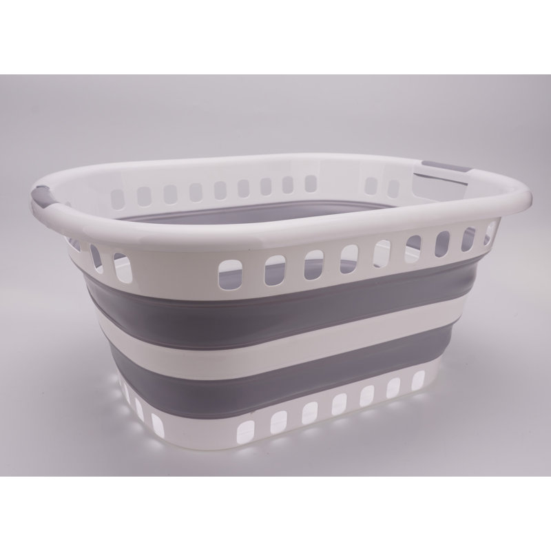 Panier à linge en plastique avec poignées