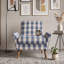 Fauteuil d'appoint rembourré avec accoudoirs arrondis et pieds en bois-317260742