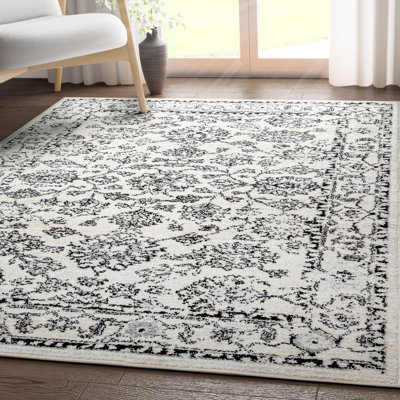 Tapis ivoire à bordure oriental botanique persan Espitia Palace