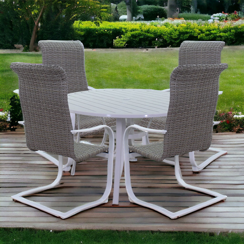 Anaclet 4 - Person Patio Dining Set with Round Table , Cushions Included, Brown/Black