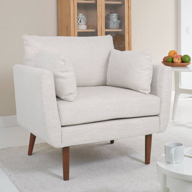 Élégant fauteuil club en tissu beige: un confort intemporel pour votre espace de vie