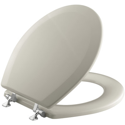 Siège de toilette à devant rond Triko avec charnières en chrome poli
