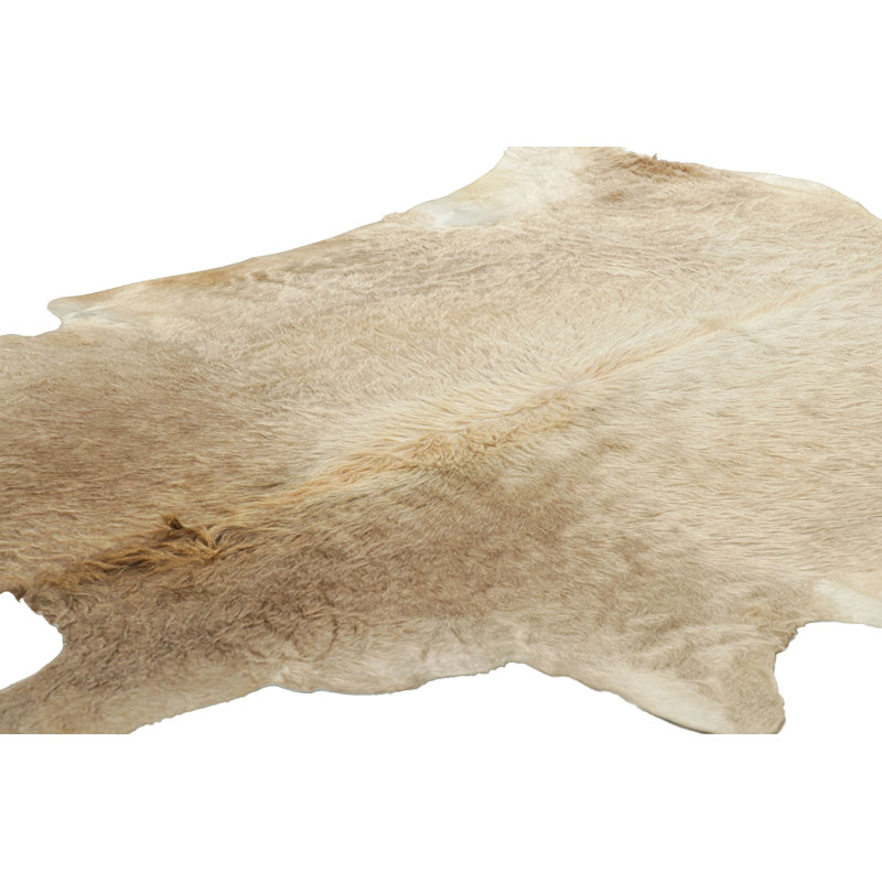 Rug & Kilim’S Large Cowhide Rug In Beige-Brown And Cream Tones