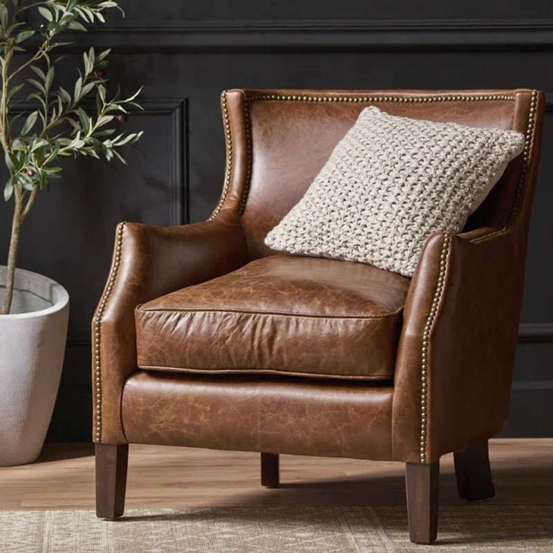 Fauteuil de détente en cuir brun et revêtement de grain supérieur simple