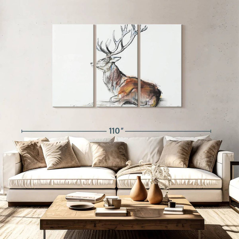 Cerf assis, H 48 po x l 74 po