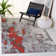 Drury Looped/Hooked Orange Rug