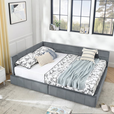 Lit de jour moderne rembourré avec tiroirs et dossier pour chambre ou chambre d'amis