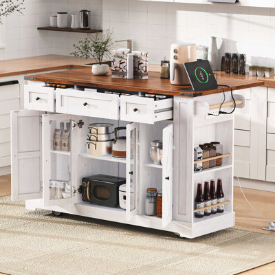 Îlot de cuisine avec deux portes d'armoire en verre trempé, prise de courant