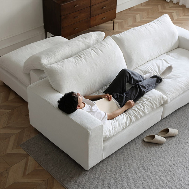 Coussin modulaire blanc en polyester, H 25,59 po x l 134,65 po x P 44,88 po