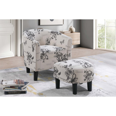 Fauteuil d'appoint rembourré en tissu blanc avec dossier incurvé et accoudoirs d'apparence noire