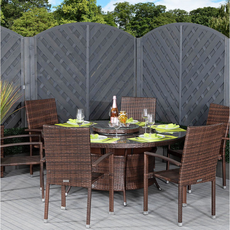 Faust 6 - Person Patio Dining Set with Round Table , Cushions Included