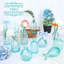 Ensemble de 12 petits vases décoratifs en verre bleu | Petits vases à fleurs vintage en verre côtelé, vendus en gros. Idéal pour les pièces maîtresses de table de mariage, d'enterrement de vie de jeune fille ou de fête. Décoration de table pour la maison et le salon.