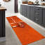 Tapis à poils doux avec motif géométrique rouge et bleu éclatant, idéal pour ajouter une touche de couleur à tout espace de vie-1164088365