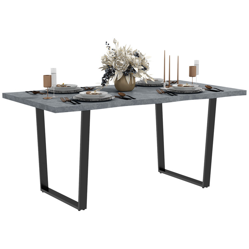 Table de salle à manger avec plateau de table à bord ondulé et pieds en acier