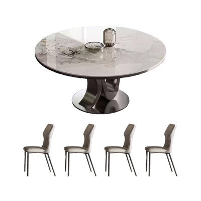 Round dining table with rock slabs
