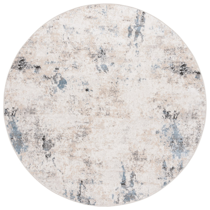 Ivory and Beige Abstract Synthetic 8' x 10' Rug